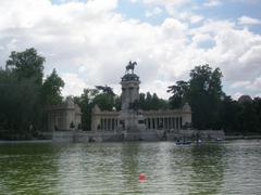 El Retiro Park in Madrid with a view of the pond and surrounding trees