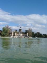 Pond in Retiro Park in Madrid with Monument to Alfonso XII in the background