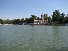 Pond in Retiro Park, Madrid with Monument to Alfonso XII in the background