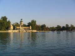 Pond in Retiro Park with the Monument to Alfonso XII in the background, Madrid, Spain