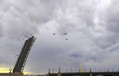 Helicopters flying over Troitsky Bridge