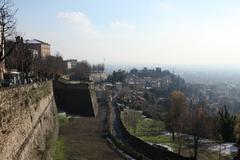 Bergamo cityscape in winter with mountains in background