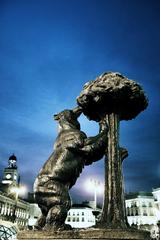 construction in Madrid, Spain with a bear sculpture in the foreground