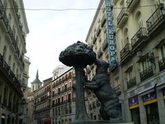 Statue of a bear in a public square