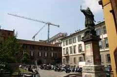 Piazza Borromeo in Milan with Palazzo Borromeo palace in the background and the back side of the statue to Saint Charles Borromeo