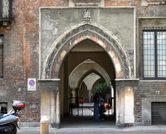 gothic-style portal of Palazzo Borromeo in Milan, Italy