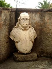 Bust on the outside stairs of Palazzo Duchi di Santo Stefano in Taormina