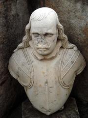 bust on stairs of Palazzo Duchi di Santo Stefano in Taormina