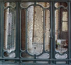 rococo wrought iron gate at the entrance of Palazzo Dugnani in Milan