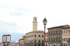 Street light against a backdrop of Pisa's architecture