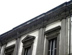 Monte di Pietà building with Latin inscription in Milan