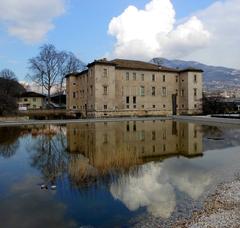 Palazzo delle Albere in Trento with reflections on water