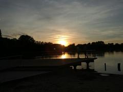 artificial lake at sunset in Parco delle Cave, Milan