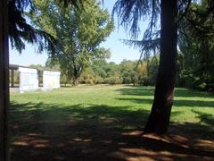 Scenic view of Parco delle Cave in Milan with lush greenery and tranquil lake