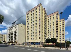 Dom Kereta visible in the gap between buildings on Żelazna 74 and Chłodna 22 in Warsaw