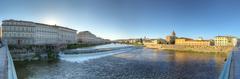 Sunrise over the Arno River in Florence, Italy, on June 16, 2013