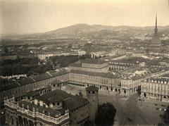 Panoramic view of Turin from Torre Littoria towards Piazza Castello with Palazzo Madama in the foreground and Mole Antonelliana in the background