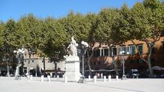 Panoramic view of Lucca's historic buildings and lush greenery