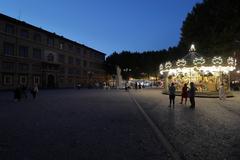 night view of Piazza Napoleone monument in Italy