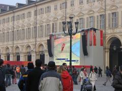 people watching a race on screen in Piazza San Carlo, Turin