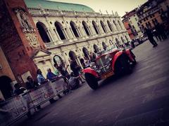 1937 Aston Martin 15/98 in the Mille Miglia race outside Basilica Palladiana, Vicenza