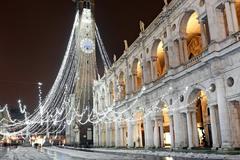 Basilica by night in Piazza dei Signori, Italy with snow