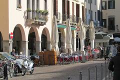 Piazza della Frutta in Padua, Italy with market stalls and historic buildings