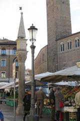 ornate Romanesque column in Piazza della Frutta