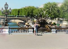 A couple kissing in a park in France