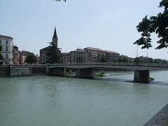 Ponte Nuovo bridge and Chiesa di San Tomaso Cantuariense in Verona with Adige River