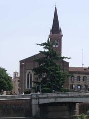 Ponte Nuovo bridge over Adige river in Verona with San Tomaso Cantuariense church in the background