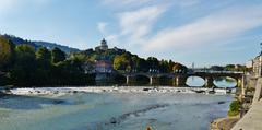 the Po River flowing through Turin with historical buildings along its banks