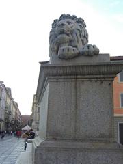 Lion statue at the entrance of Ponte dei Leoni in Monza