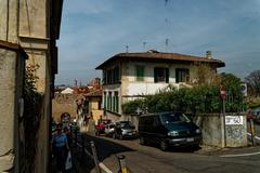 view of Florence from Via del Monte alle Croci with Porta San Miniato, Giotto's Bell Tower, and Florence Cathedral dome in the background