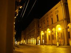 Night view of the arcades in Bologna, Italy