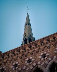 Frere Hall, Karachi, historic building with clock tower and green gardens