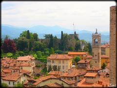 Bérgamo cityscape in Italy with historical buildings and lush greenery