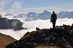 Josh Lofgreen hiking above the clouds in Chugach State Park, Alaska