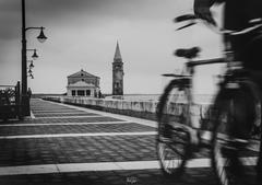 Caorle beach with a morning breeze and an elderly man