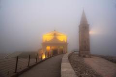 Santuario Madonna dell'Angelo covered in November mist