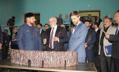 Chairman Mikhail Fedotov at Wall of Grief exhibition in Chechnya