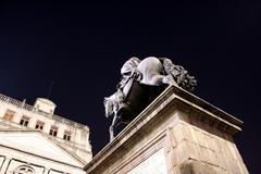 statue of El Caballito at night