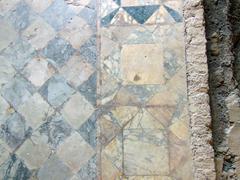 Tepidarium niche with tub and sectile flooring at Terme Taurine in Civitavecchia