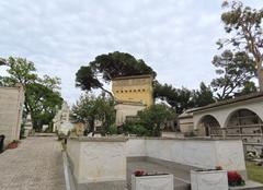 ancient tombs and Pagana tower at the monumental cemetery in San Michele di Pagana, Rapallo