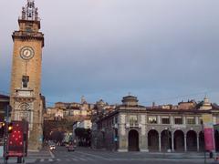 view of Via Roma in Bergamo with a backdrop of the Old Town