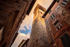 The Torre delle Ore clock tower in Lucca, Italy