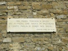 Torre della Zecca Vecchia with Dante plaque