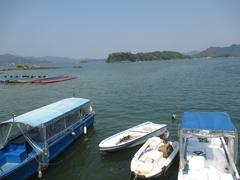 Sai Kung Town Harbour with boats and clear sky