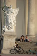 Guardian angel statue at a church entrance in Vienna