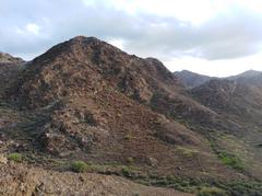 Rocky Dibba Mountain under a clear sky